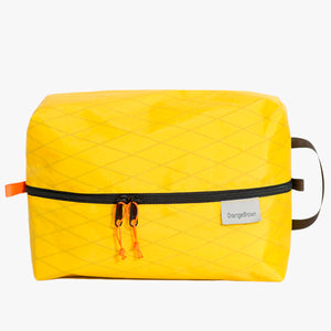 Australian made packing cube. A packing cell for travel and hiking made from yellow X-Pac fabric. YKK size 3 zipper with two siliders.