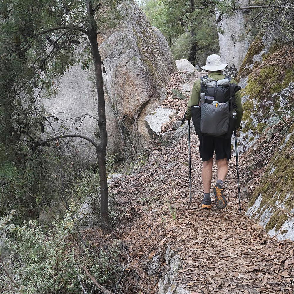 A hiker, carrying an OrangeBrown OB48 backpack, on the southern circuit in Wilsons Promontory National Park, Australia.