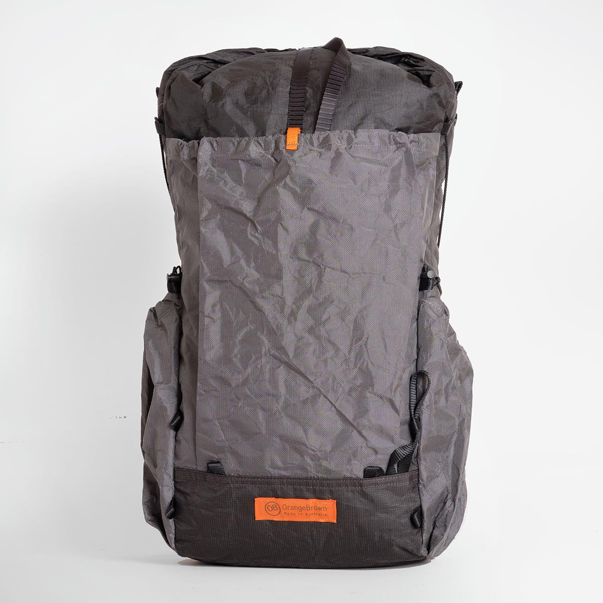 OrangeBrown backpack OB30.  A lightweight backpack with side pockets able to hold two 1 Litre bottles each. Made in Australia from Challenge Ultra fabrics.