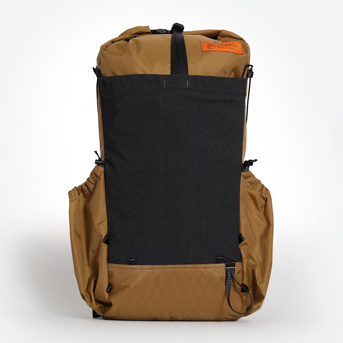 Ultralight hiking backpack OB30 coyote/brown colour. The main compartment is packed. Side pockets made from X-Pac VX21 fabric and the front pocket is made from Challenge UltraStretch 