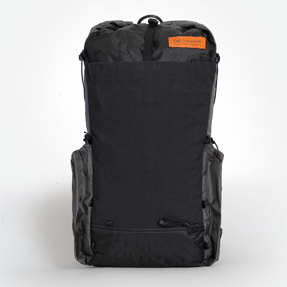OrangeBrown backpack OB30 in black and grey.  A lightweight backpack with side pockets able to hold two 1 .25 Litre bottles each. Made in Australia from Challenge Ultra fabrics.