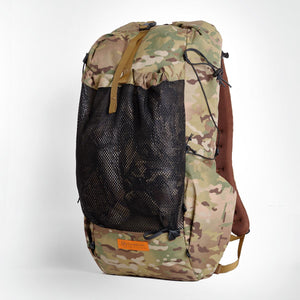 Medium sized backpack OB36 with 36 liter volume. Front mesh pocket and two side pockets.