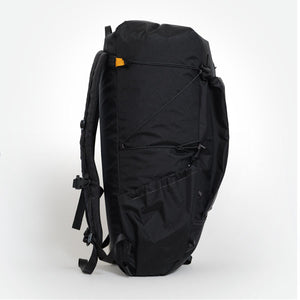 Side view of backpack OB 36 with side pocket and compression cords visible. Handmade in Australia.
