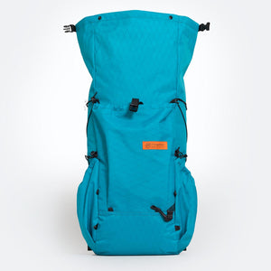 Teal hiking backpack OB 36 made by OrangeBrown with open roll top closure, ready to be loaded