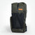 Dark green ultralight hiking backpack with roll top closure and three external pockets. White background.