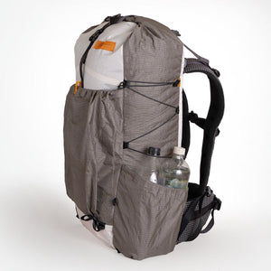 Backpack OB55 with large front pocket and side pockets fitting two 1.25L bottles each