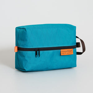 Packing cube made from teal coloured X-Pac VX21 X-Pac fabric . 