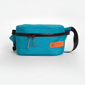 Fanny Pack made by OrangeBrown from X-Pac fabric in colour teal with a 25 mm webbing belt and #5 YKK zip
