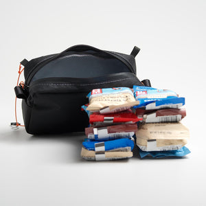 Hip belt pocket holds 10 Clif bars and a lip balm.