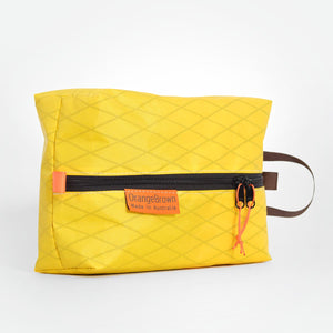 Yellow packing cube, packing cell for travel and hiking. Made in Australia from X-Pac  VX21 fabric.