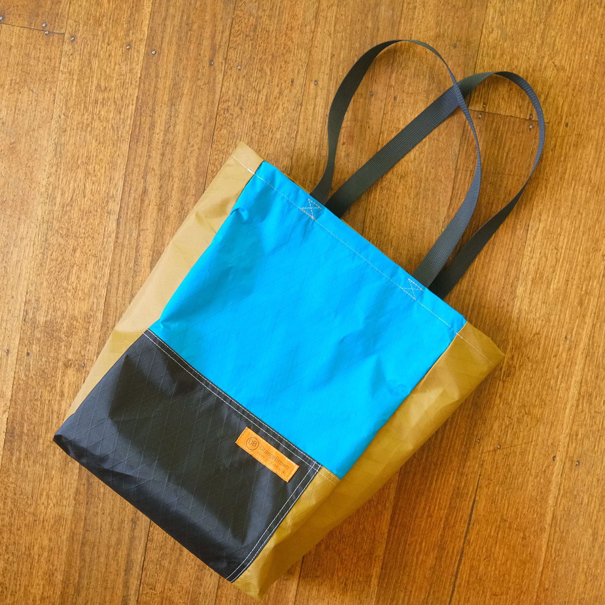 ‘The Bag’ by OrangeBrown. Tote, shopping or shoulder bag made from hi-tech fabrics. Each bag is unique. Made in Australia.