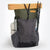 Ultralight hiking backpack OB55 by OrangeBrown loaded with gear. Made from dark green X-Pac VX21