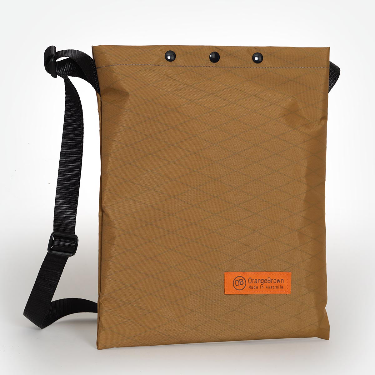 A sling bag made by OrangeBrown in Australia from coyote coloured X-Pac VX21 fabric.
