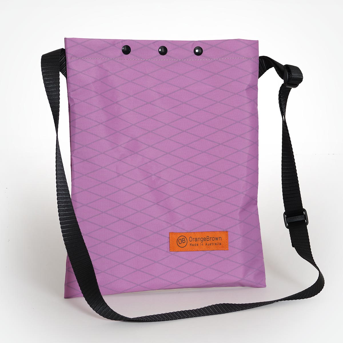 A shoulder bag made by OrangeBrown in Australia from pink/mulberry coloured X-Pac VX21 fabric