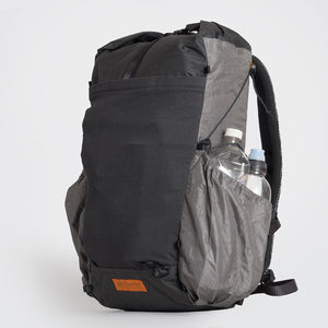 OrangeBrown backpack OB30.  A lightweight backpack with side pockets able to hold two 1 Litre bottles each. The side compression cord ties down the second water bottle.