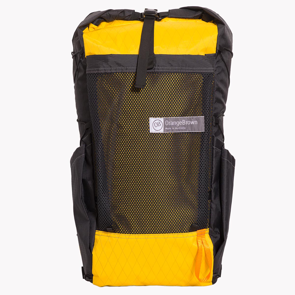Medium sized backpack in yellow and black X-Pac fabric. The pack has a volume of 36 L including two side pockets and a front mesh pocket. Side compression cord with a Line Loc 3 and an orange webbing loop to fix the trekking poles. Made in Australia.