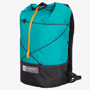 X-Pac fabric day pack with roll closure in teal-black. Handmade in Australia.