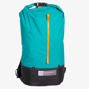 X-Pac fabric day pack with roll closure in teal-black. Made in Australia.
