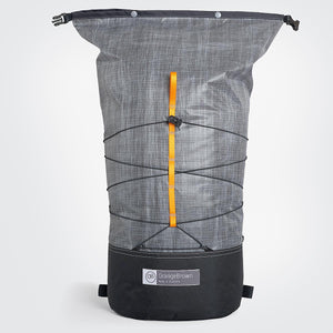 Frontal view of ultralight day pack with open roll top in grey-black. Made in Australia.