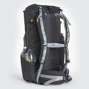 OrangeBrown OB 48 backpack with padded shoulder straps and hip belt. Sternum strap with emergency whistle and carry handle. Handmade from Challenge Ultra fabric in black and grey..