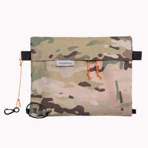 Camouflage sternum strap bag made from black X-Pac X-33 fabric with Cordura® face fabric.