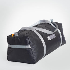 Pull handles on the short side of an OrangeBrown Travel Bag.